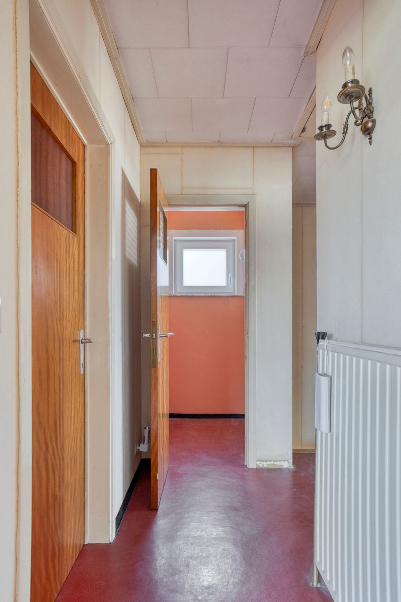 Te renoveren open bebouwing met zuidgerichte tuin foto 16