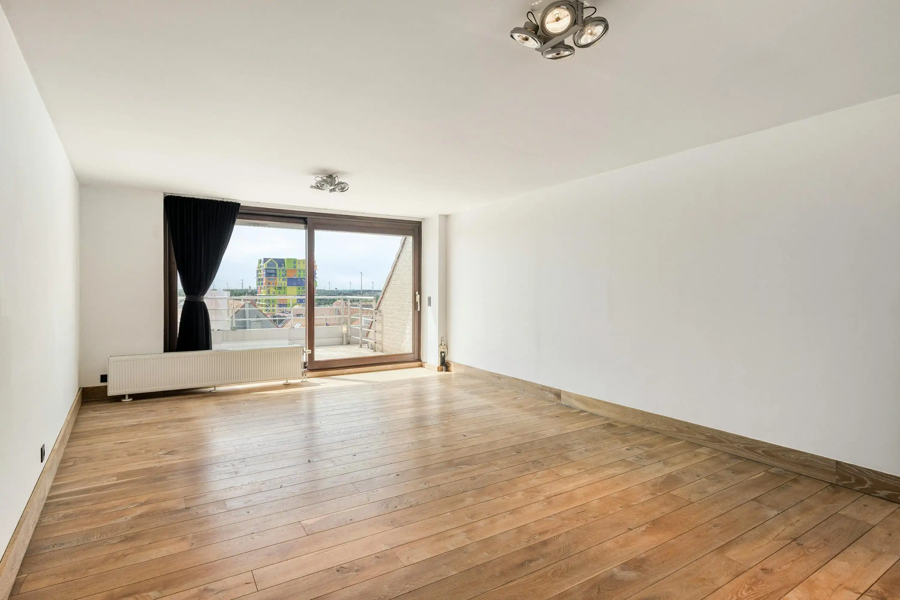 Instapklaar appartement met zonnig terras te koop in Heist foto 7