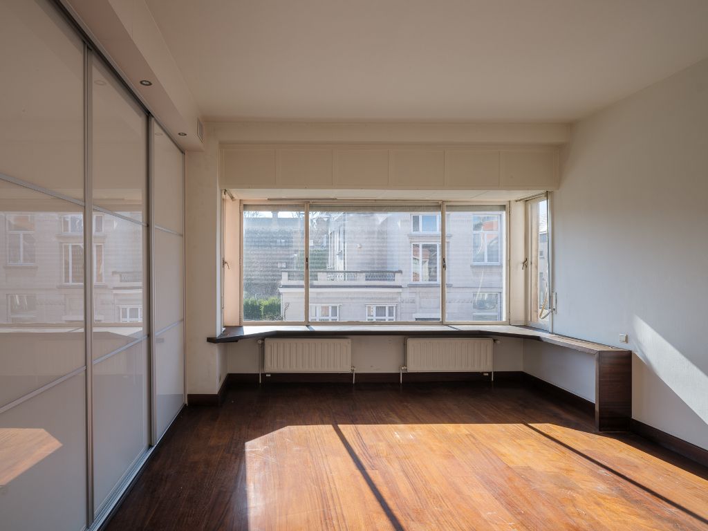 Voormalige dokterswoning met praktijkruimte en stadstuin foto 11