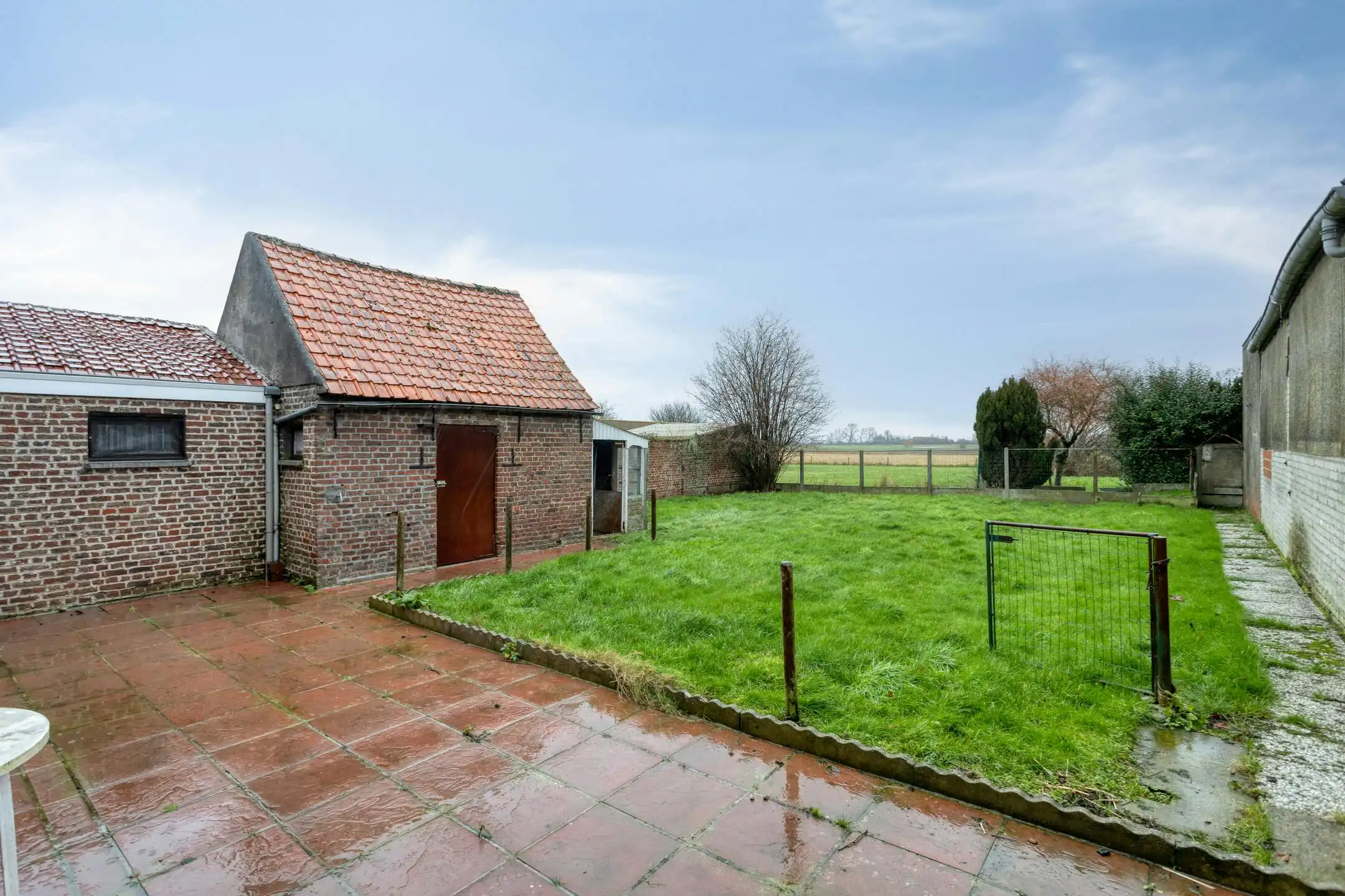 Ruime woning met tuin en garage op 380m² te Leisele. foto 9