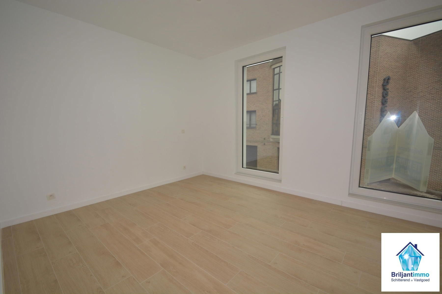 Ongelooflijk tof BEN appartement incl staanplaats en terras foto 8