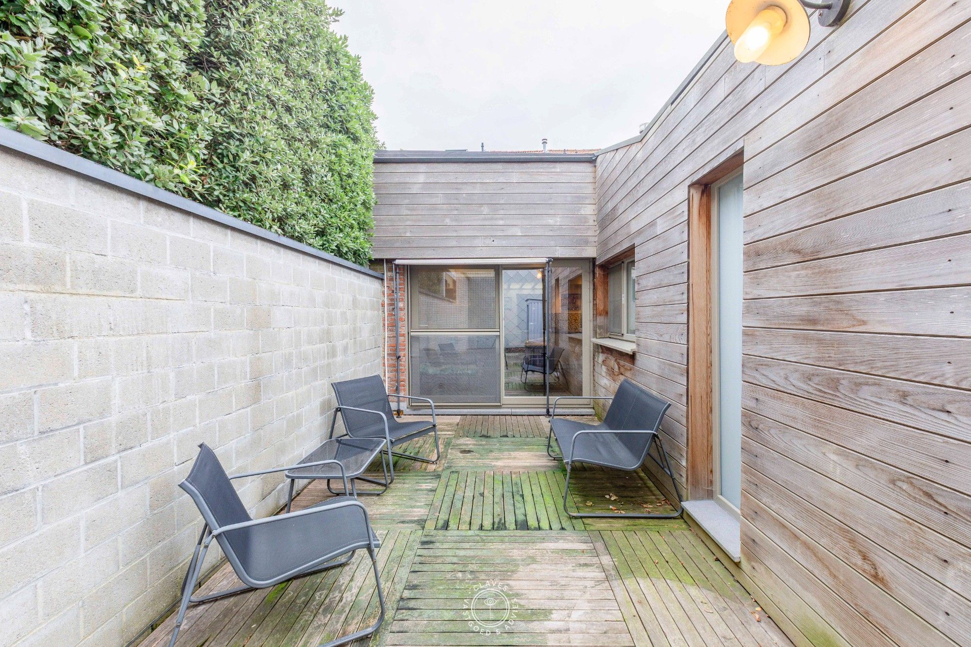 Drieslaapkamer woning met handelsfunctie aan het station van Beveren foto 5