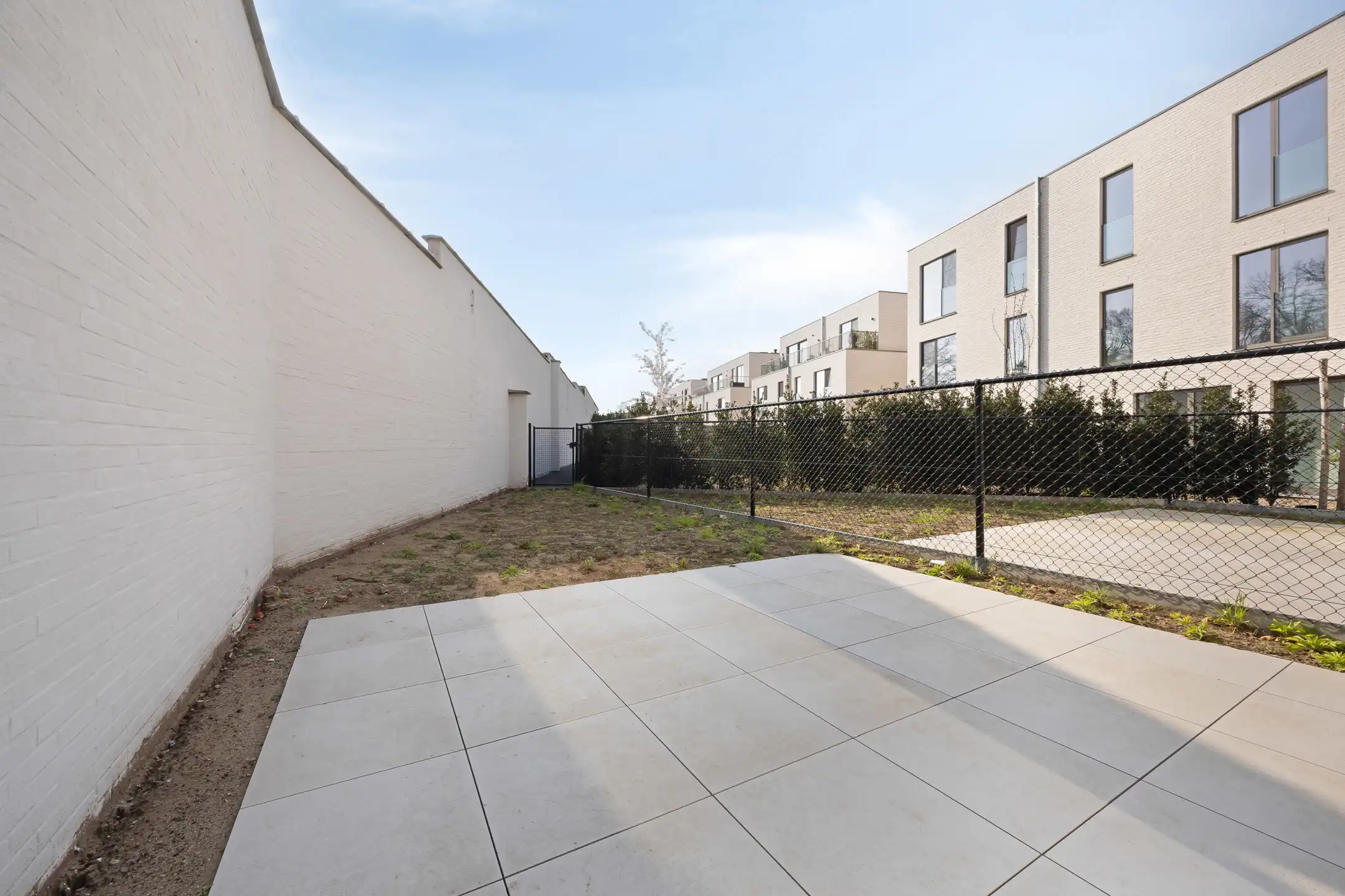 Stijlvol gelijkvloers appartement met tuin foto 16