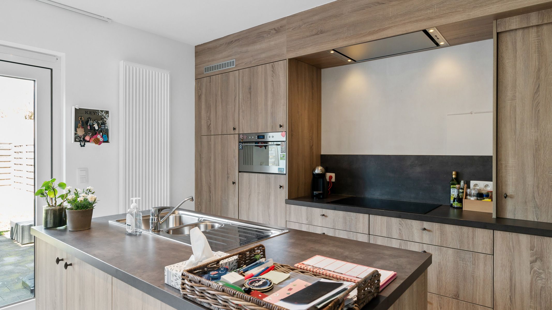 Gelijkvloers appartement met tuin en 2 autostaanplaatsen (1 ondergronds met berging en 1 bovengronds) foto 6