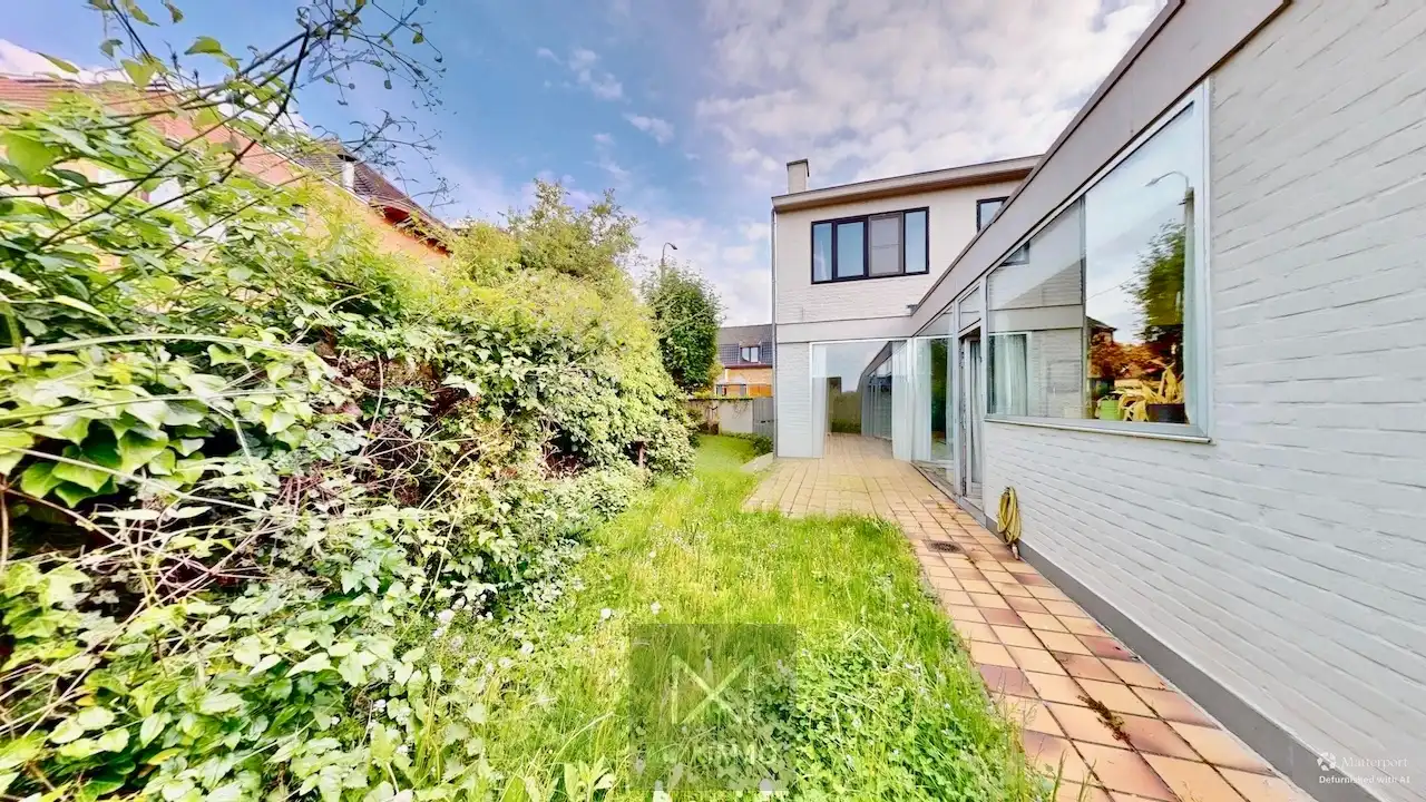 Ruime hoekwoning met 3 garages, polyvalente ruimtes én tuin in hartje Lauwe foto 15