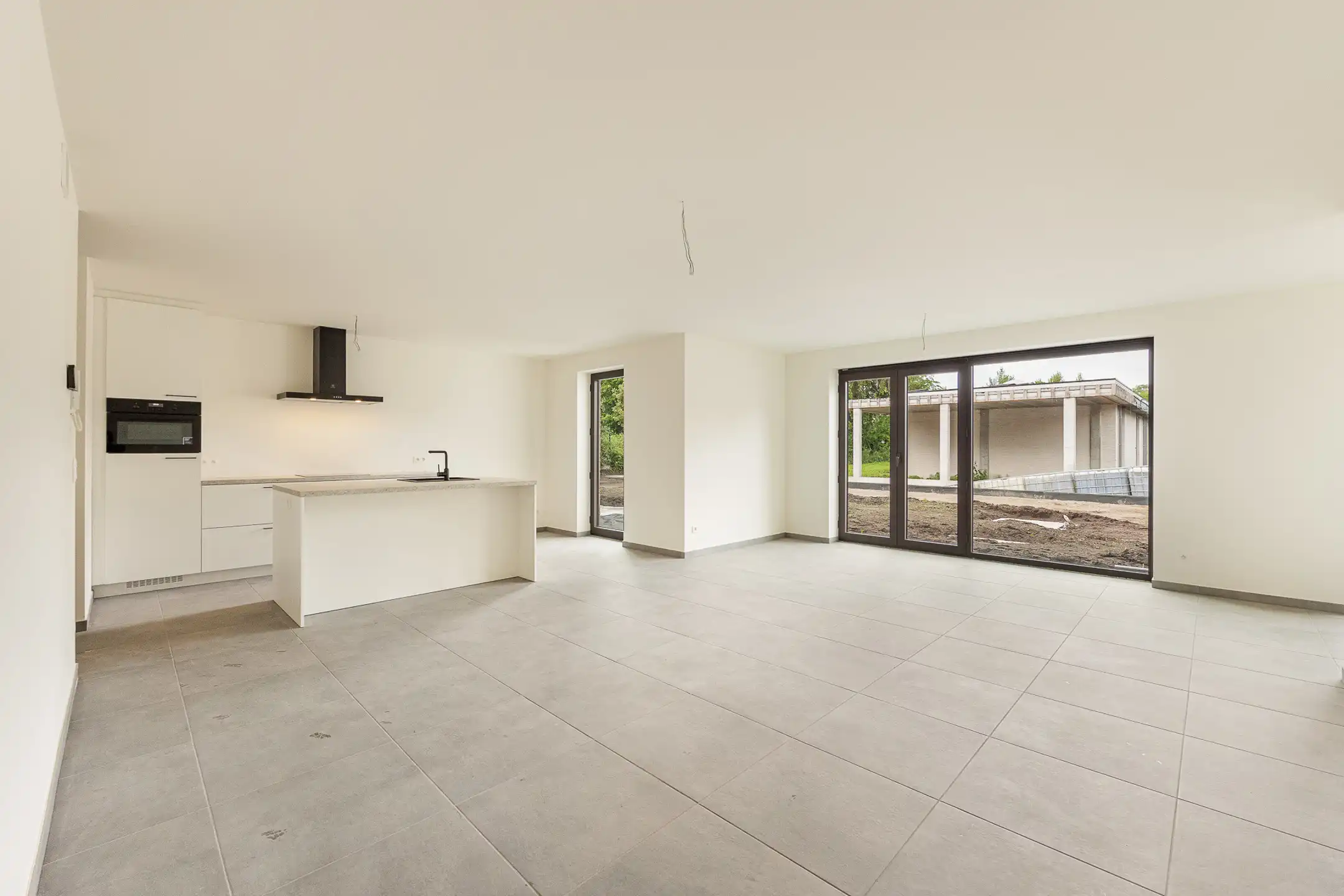 Nieuwbouw gelijkvloers appartement met tuin en terras foto {{pictureIndex}}