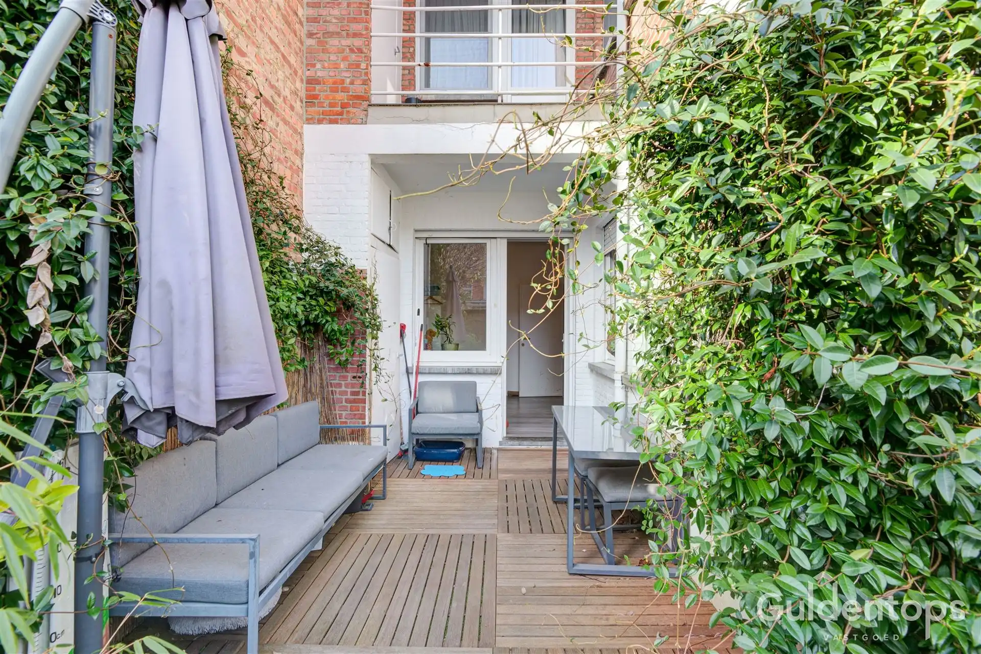 zeer goed gelegen ruim 2 slaapkamerappartement mét tuin foto 19