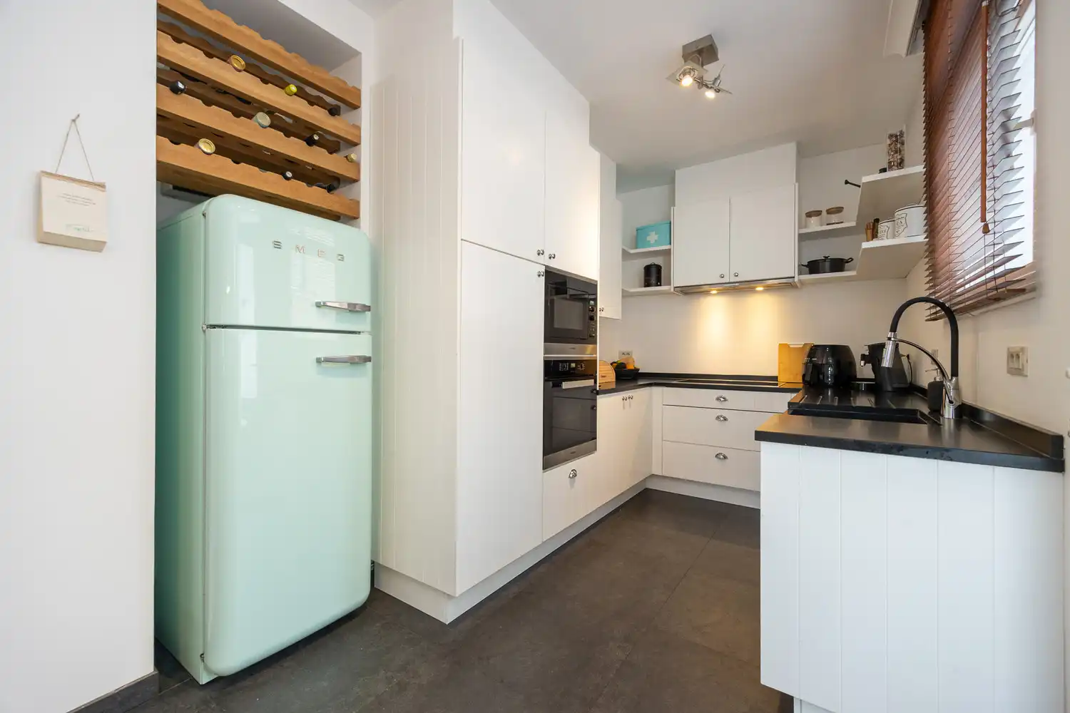 Gerenoveerd 3-slpk appartement van 130 m² met terras in Klein-Antwerpen foto 16