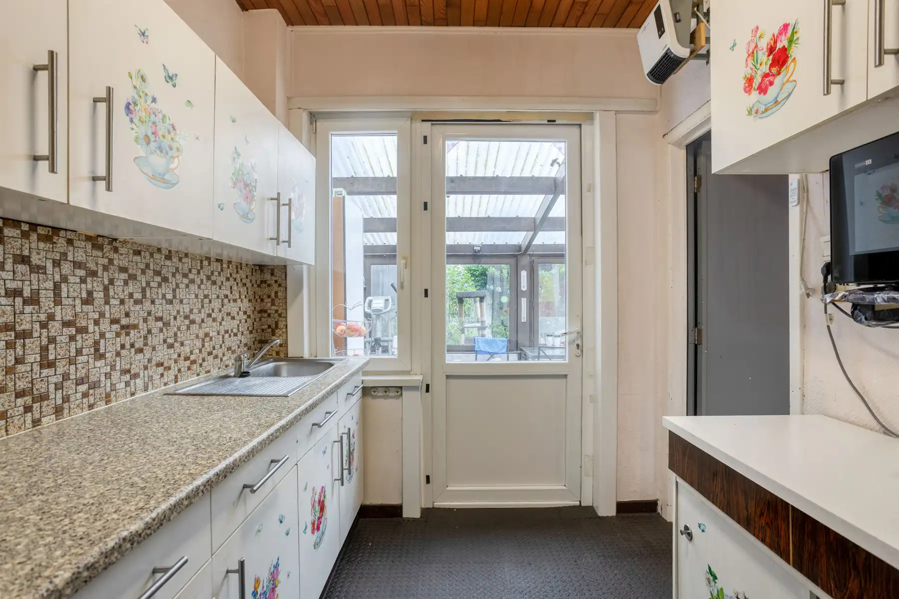 Te moderniseren woning met tuin en garage te Denderleeuw foto 9