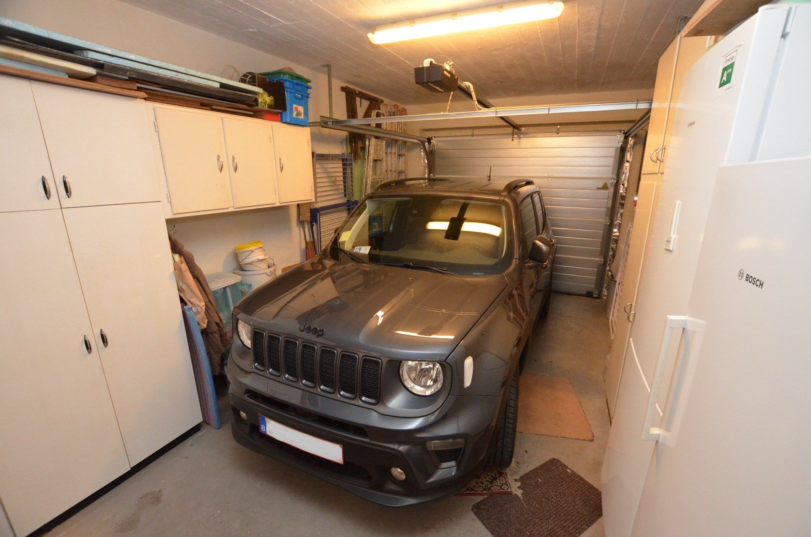 Mooi gelegen goed onderhouden herenhuis met garage foto 25