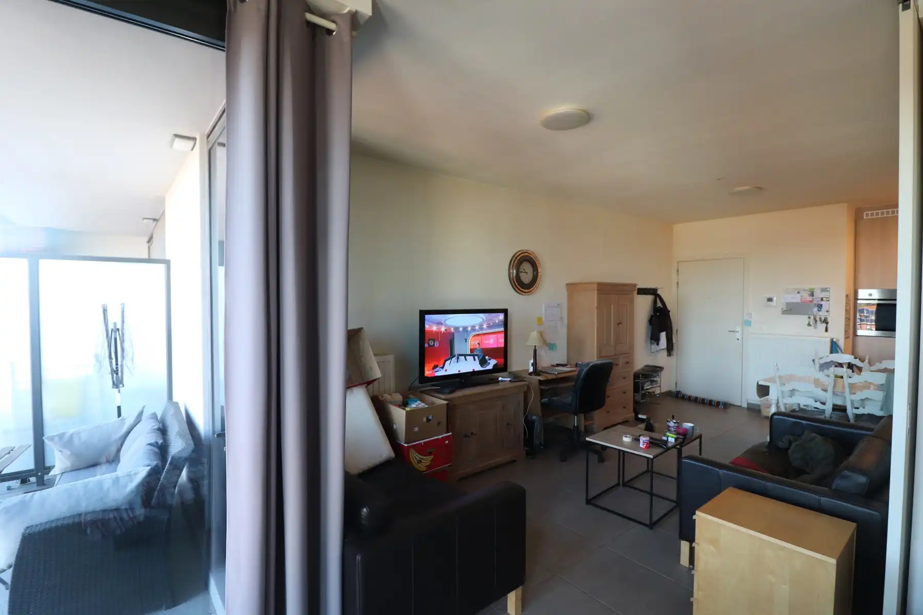 Studio op de dakverdieping met lift,  terras en kelderberging. foto 4