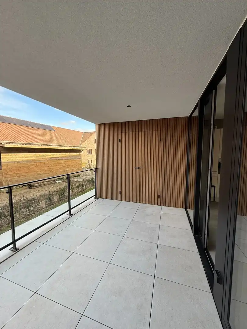 Instapklaar en energiezuinig gelijkvloers appartement met 1 slaapkamer en ruim terras te Riemst. foto 3