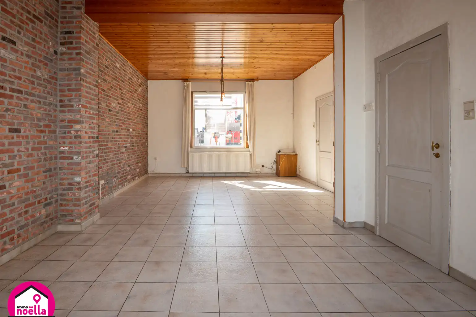Te koop: te renoveren rijwoning op toplocatie foto 8