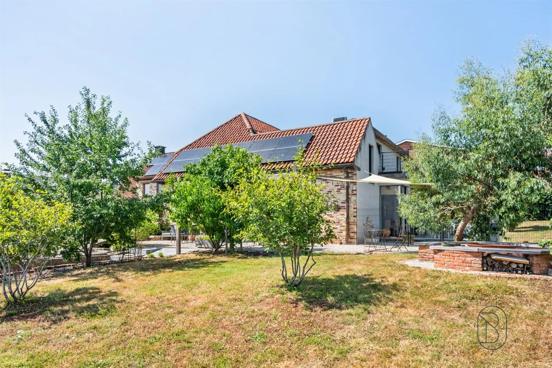 Ruime karakterwoning met 4 slk, grote tuin en charme. foto 5