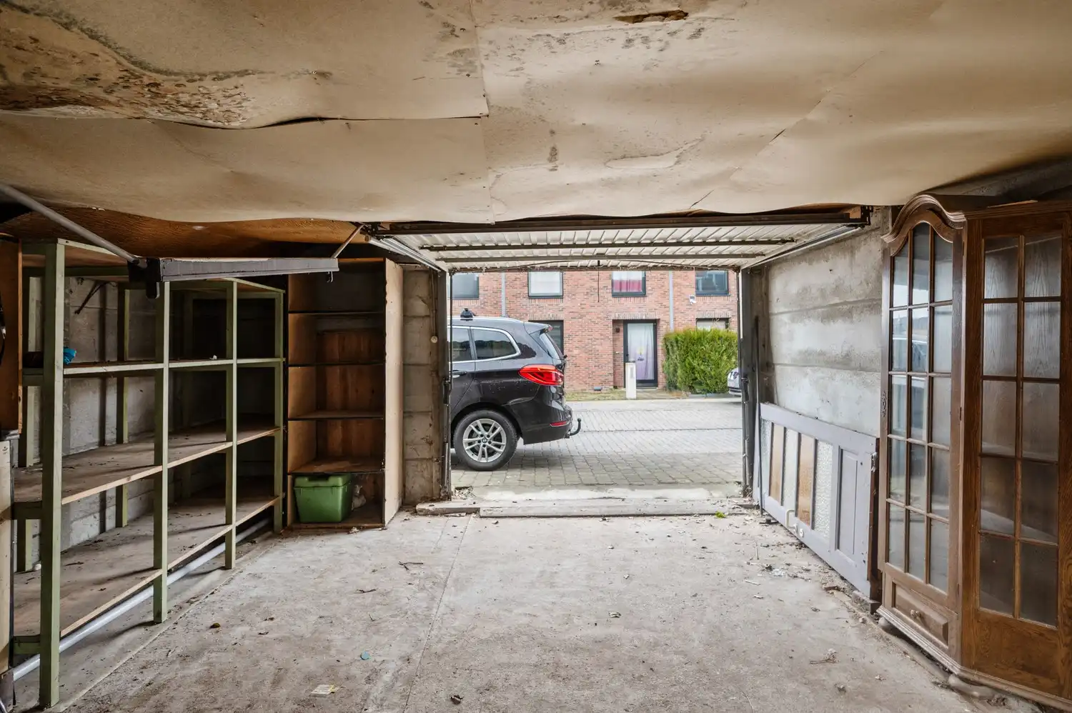 Te renoveren woning met tuin en garage in centrum Wijnegem! foto 18