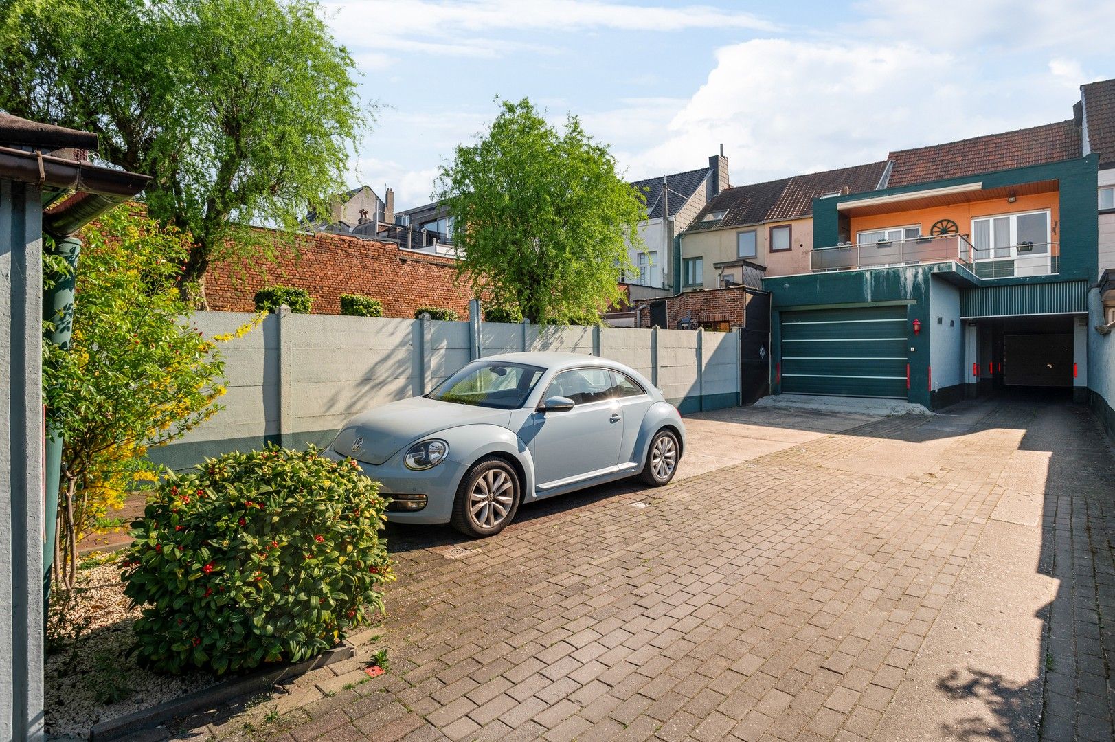 Te renoveren eengezinswoning met 17 garageboxen in Merksem foto 13