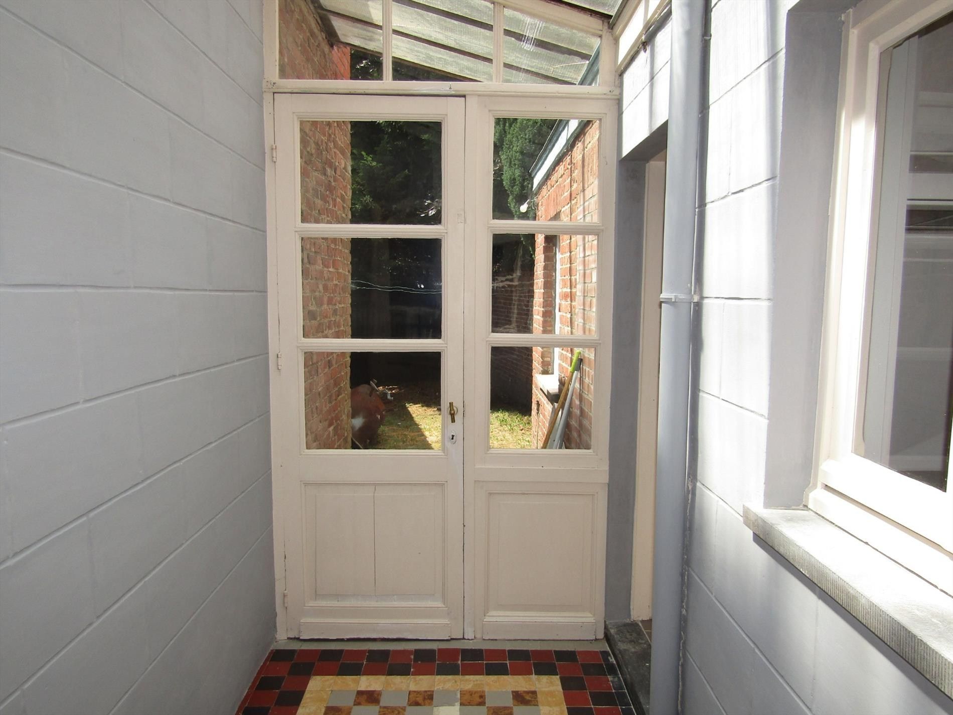 Stadswoning met 3 slpk en tuintje te koop op zeer goede locatiein Kortrijk. foto 13