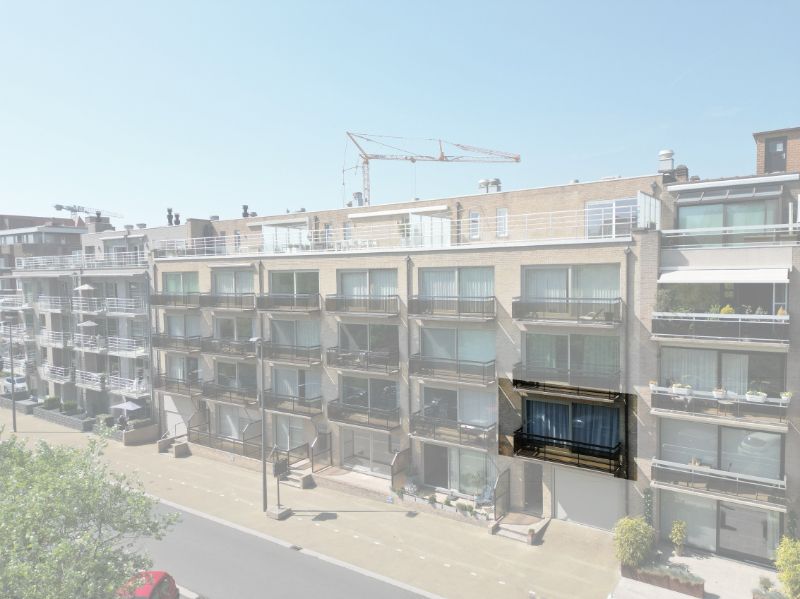 Mooi bemeubeld appartement met centrale ligging en zicht op de duinen! foto 2