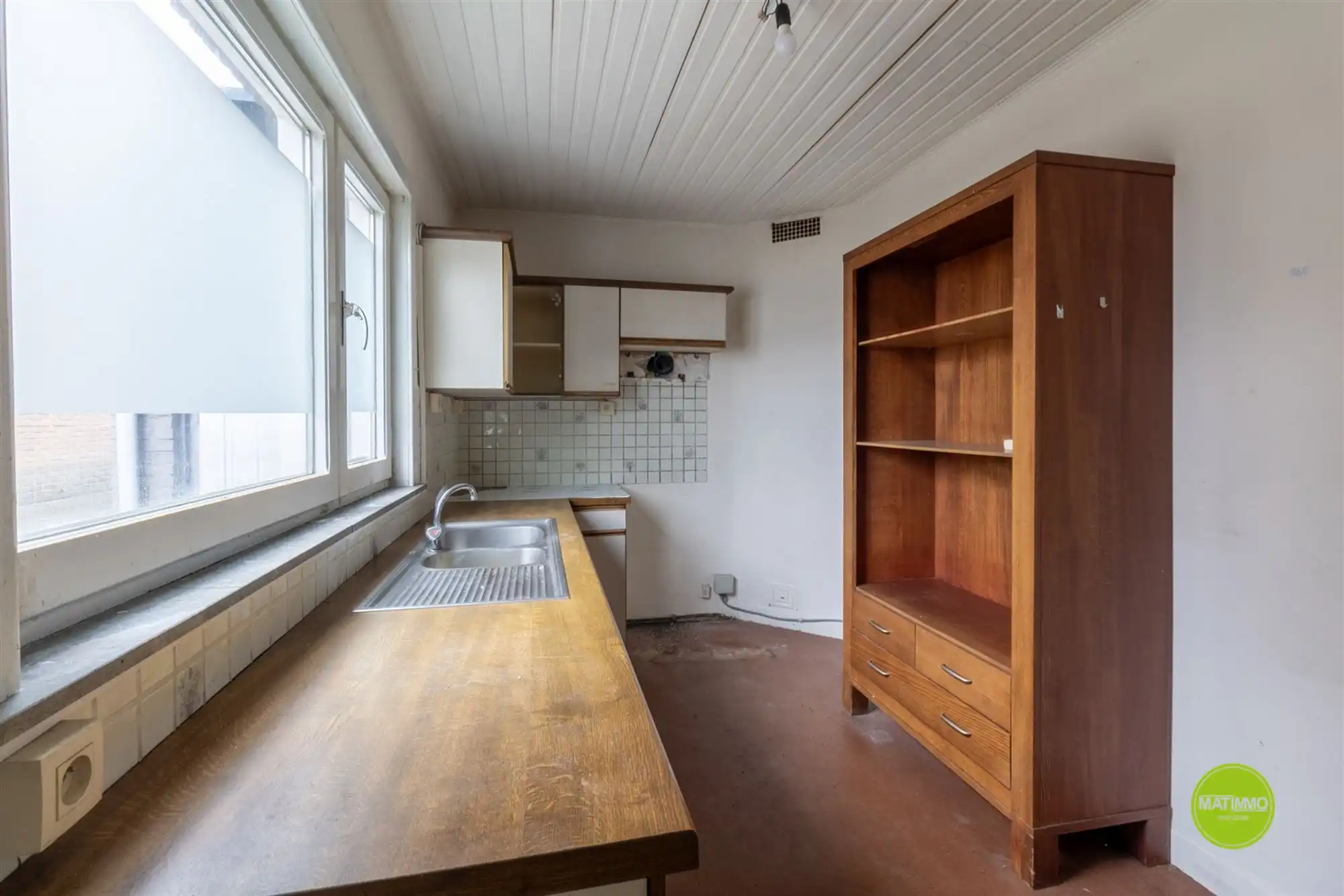 Ruim handelshuis met 4 slaapkamers én acherliggende grond foto 17