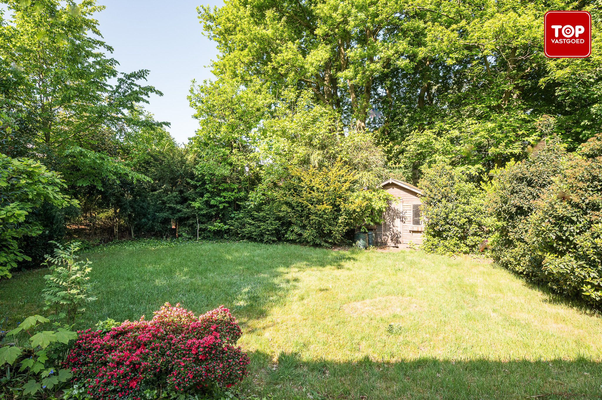 Ruime jaren zeventig villa in Mariakerke-Kolegem foto 26