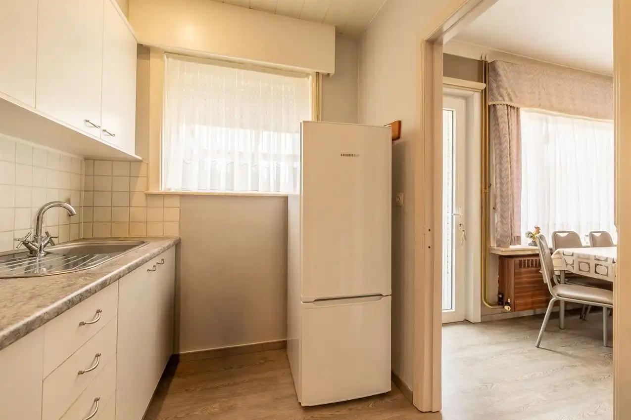 Verzorgde woning met 3slpk, inpandige garage en tuin foto 12