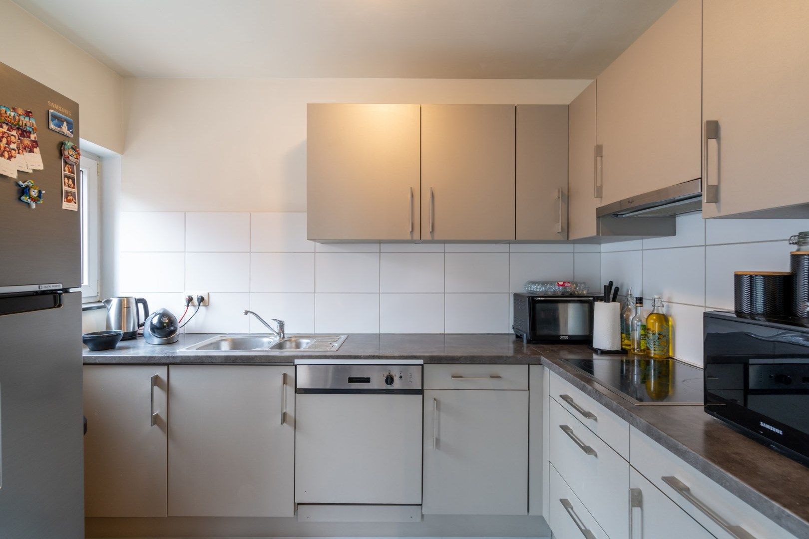 Degelijk appartement met 2 slaapkamers, standplaats en kelderberging op wandelafstand van de markt van Bilzen  foto 16