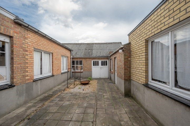 Opbrengsteigendom met 2 appartementen en garage/loods. foto 10