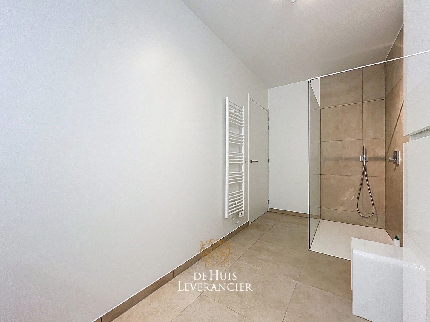 Discrete luxe & tijdloze elegantie : subliem nieuwbouwappartement met terras en gemeenschappelijk tuin te koop in Boechout foto 11
