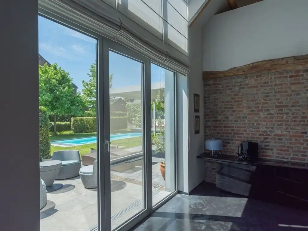 Unieke karakterhoeve met loftsfeer, design, verwarmd zwembad & poolhouse foto 7