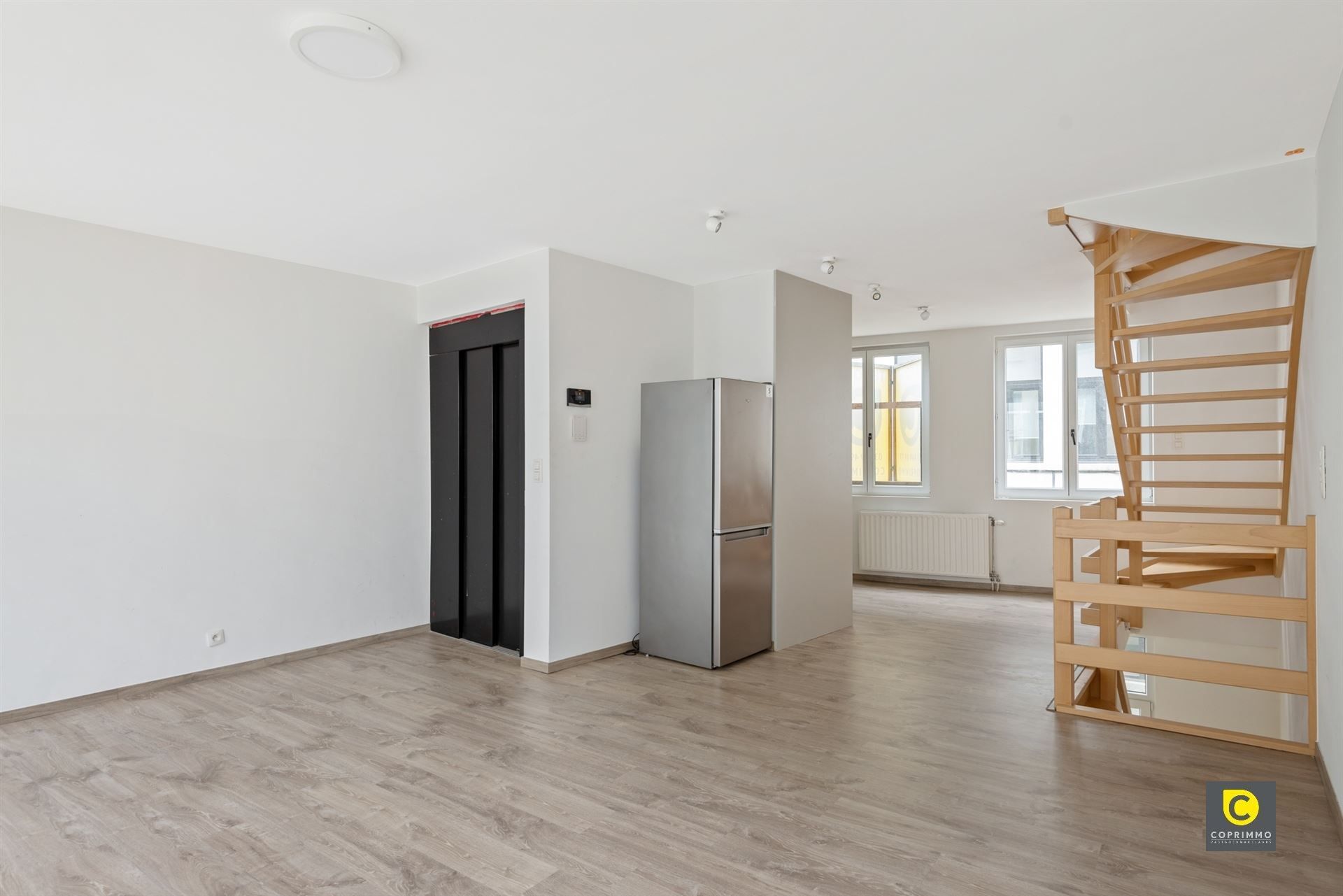 Woning (3 slpk) met lift en handelsgelijkvloers foto 4