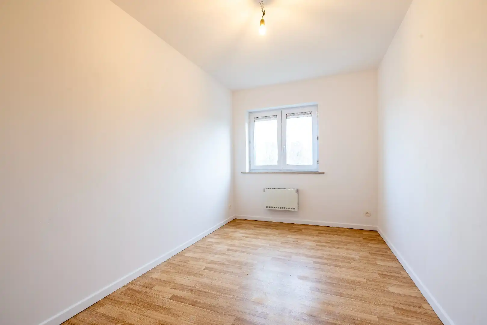 Instapklaar 3-slaapkamerappartement met autostaanplaats – ideaal als investering of eigen woonst foto 9