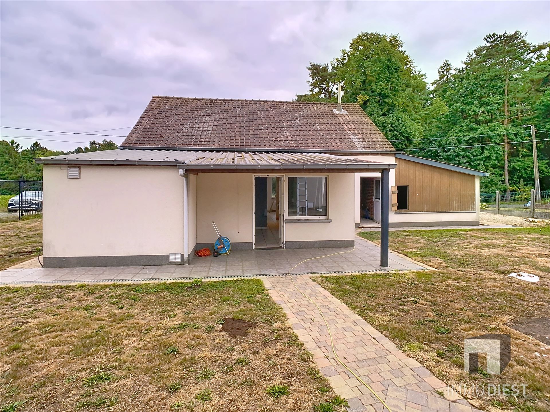 Woning + tuin + bos-en weiland foto 2