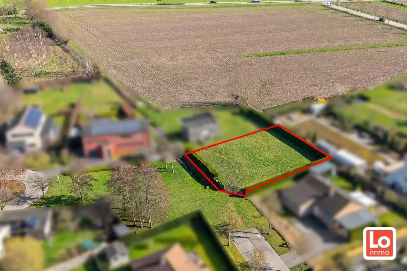 Mooi perceel bouwgrond ZONDER bouwverplichting op héél rustige locatie nabij het centrum van Lochristi! foto {{pictureIndex}}