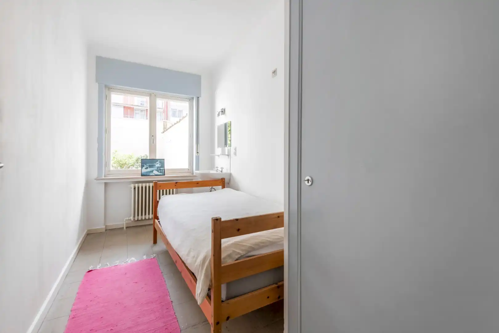 Ruim gelijkvloersappartement met 7,5m gevelbreedte en met binnenkoer 50m² gelegen vlakbij de Dumortierlaan foto 13