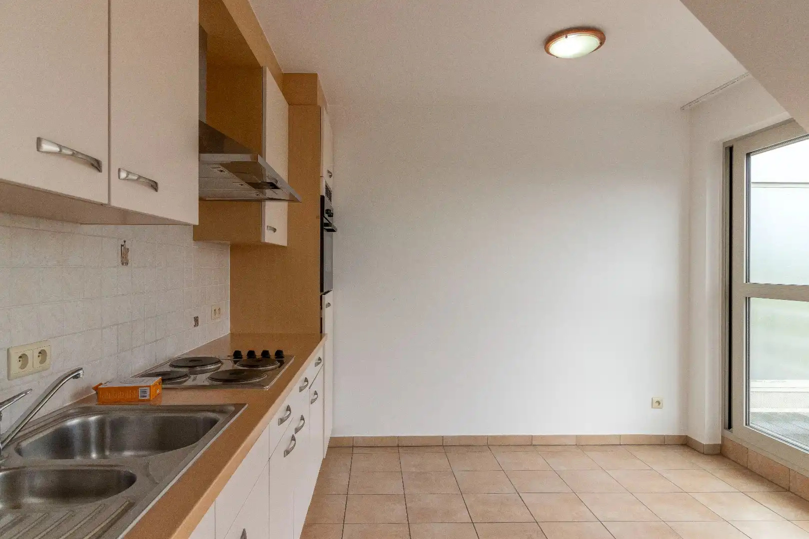Appartement in het centrum met garage én parkeerplaats! foto 5