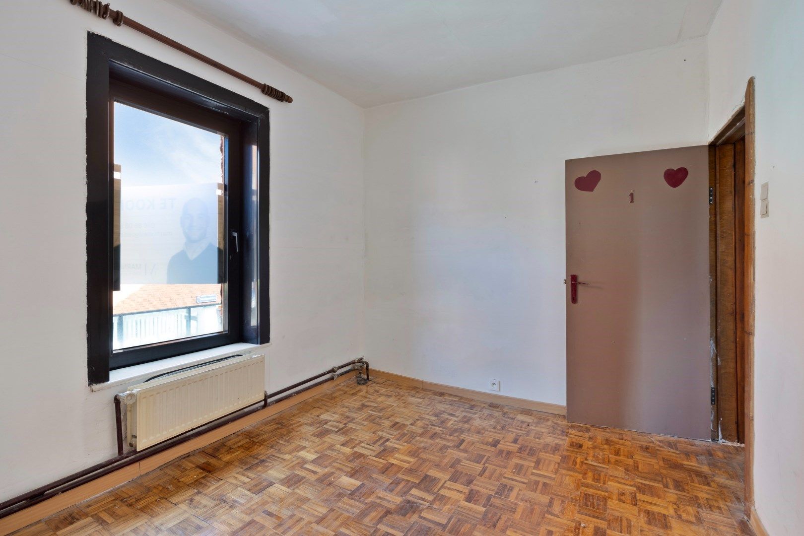 Halfopen hoekwoning met garage en dakterras op toplocatie in Kessel-Lo – renovatieproject met veel potentieel foto 25