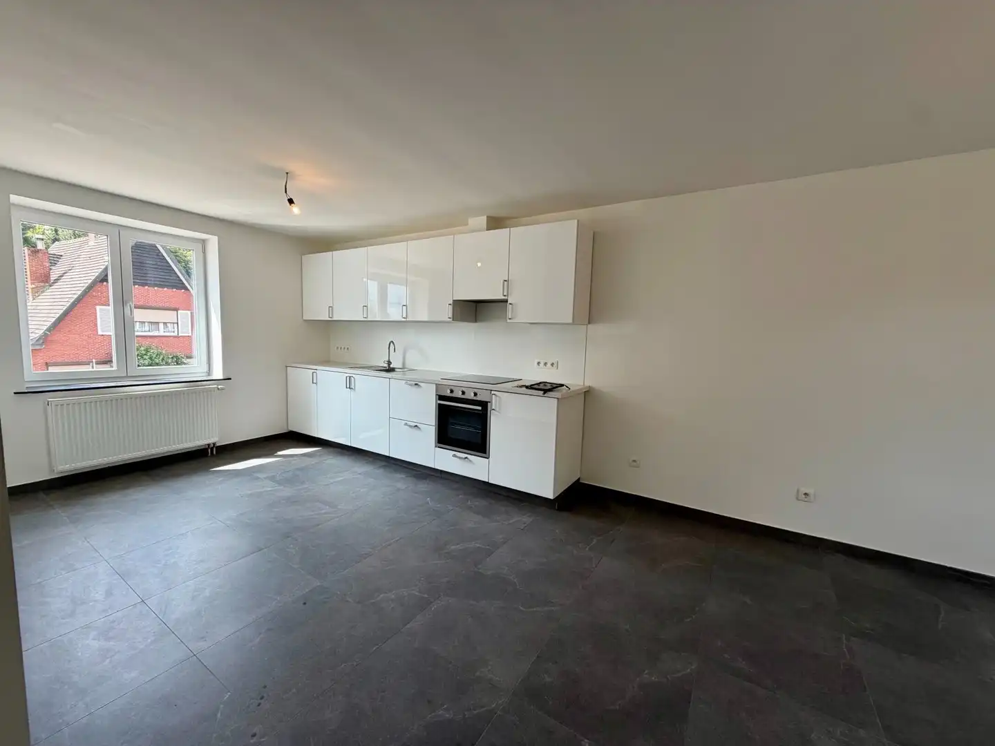 Gerenoveerd handelspand met instapklaar duplexappartement en tuintje foto 4
