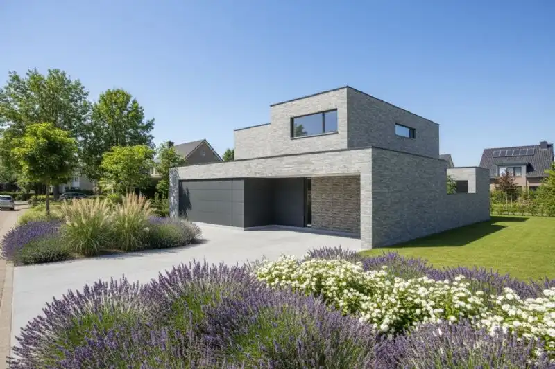 Nieuw te bouwen alleenstaande woning te Oostrozebeke. foto {{pictureIndex}}