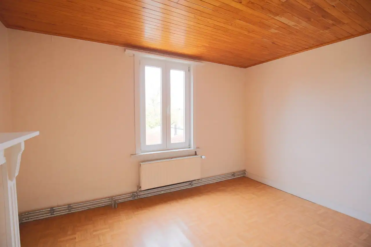 Rijwoning met terras en tuin foto 18