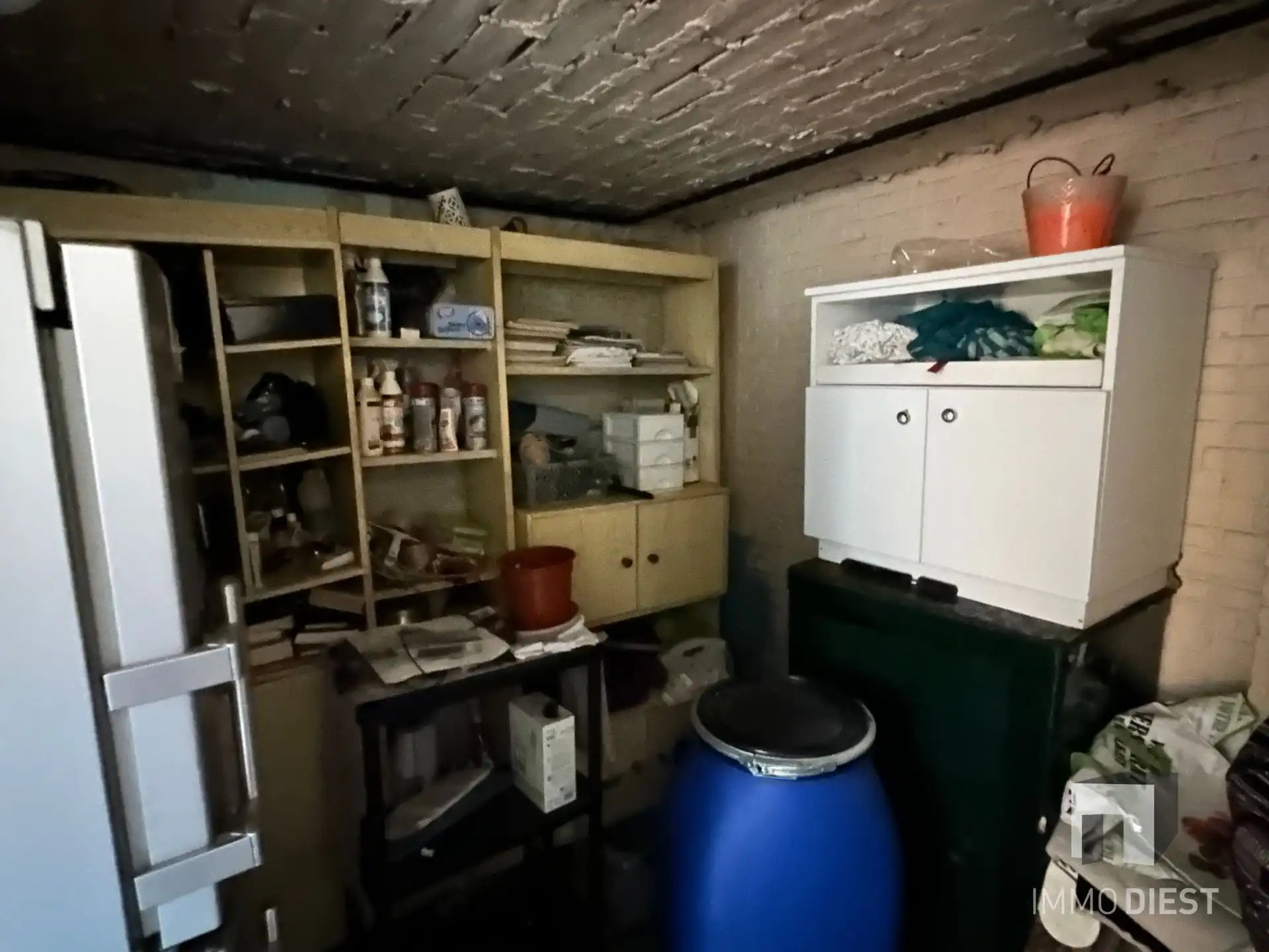 Te renoveren woning met 3 slaapkamers, 2 garages en tuin in Diest foto 30