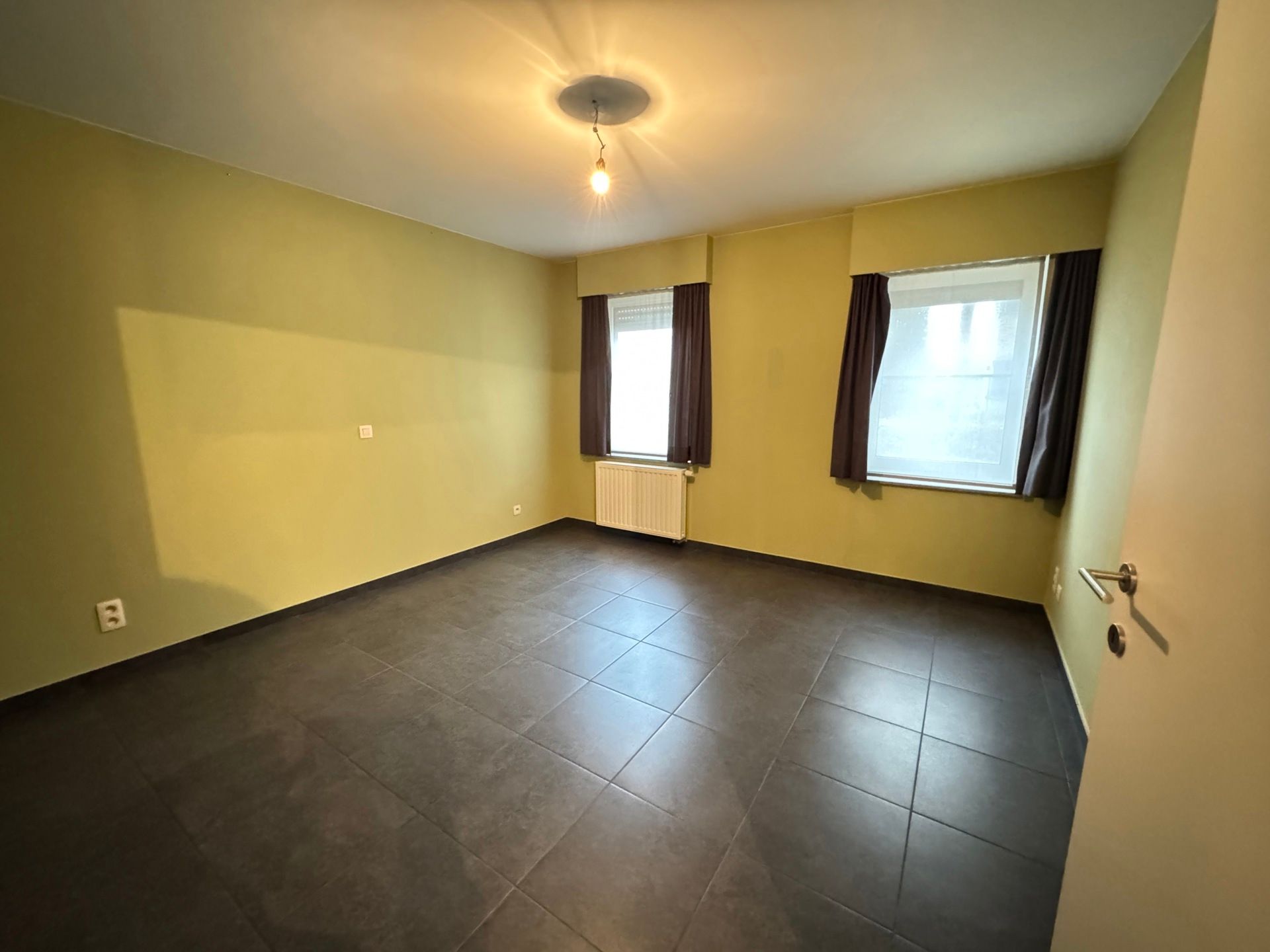 GLV appartement met tuin en ondergrondse parkeerplaats foto 2