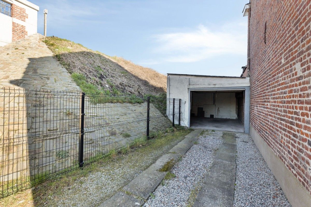 Stadswoning met garage foto 15