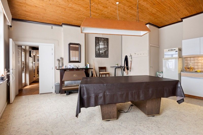 Handelspand met woonmogelijkheid en tuin – ideaal voor renovatie of herontwikkeling foto 15