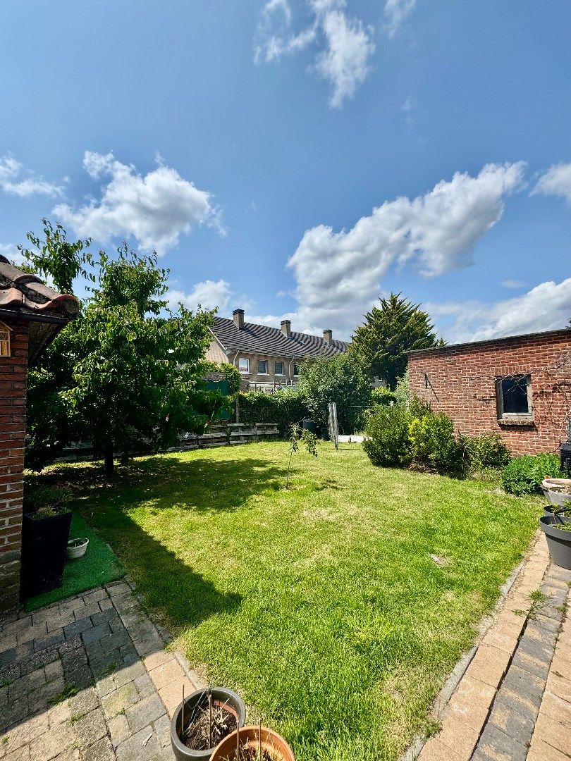 Te koop halfopen woning met garage foto 24