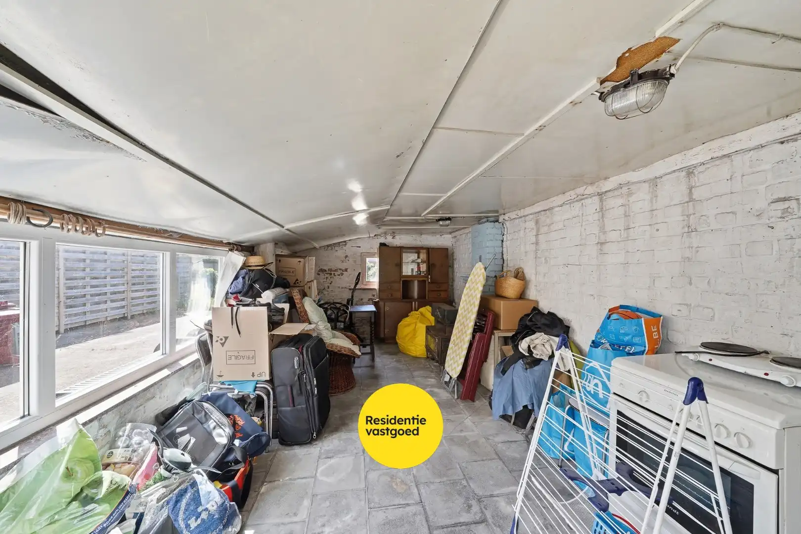 Ruime gezinswoning met tuin en garage nabij centrum Oudenburg foto 13