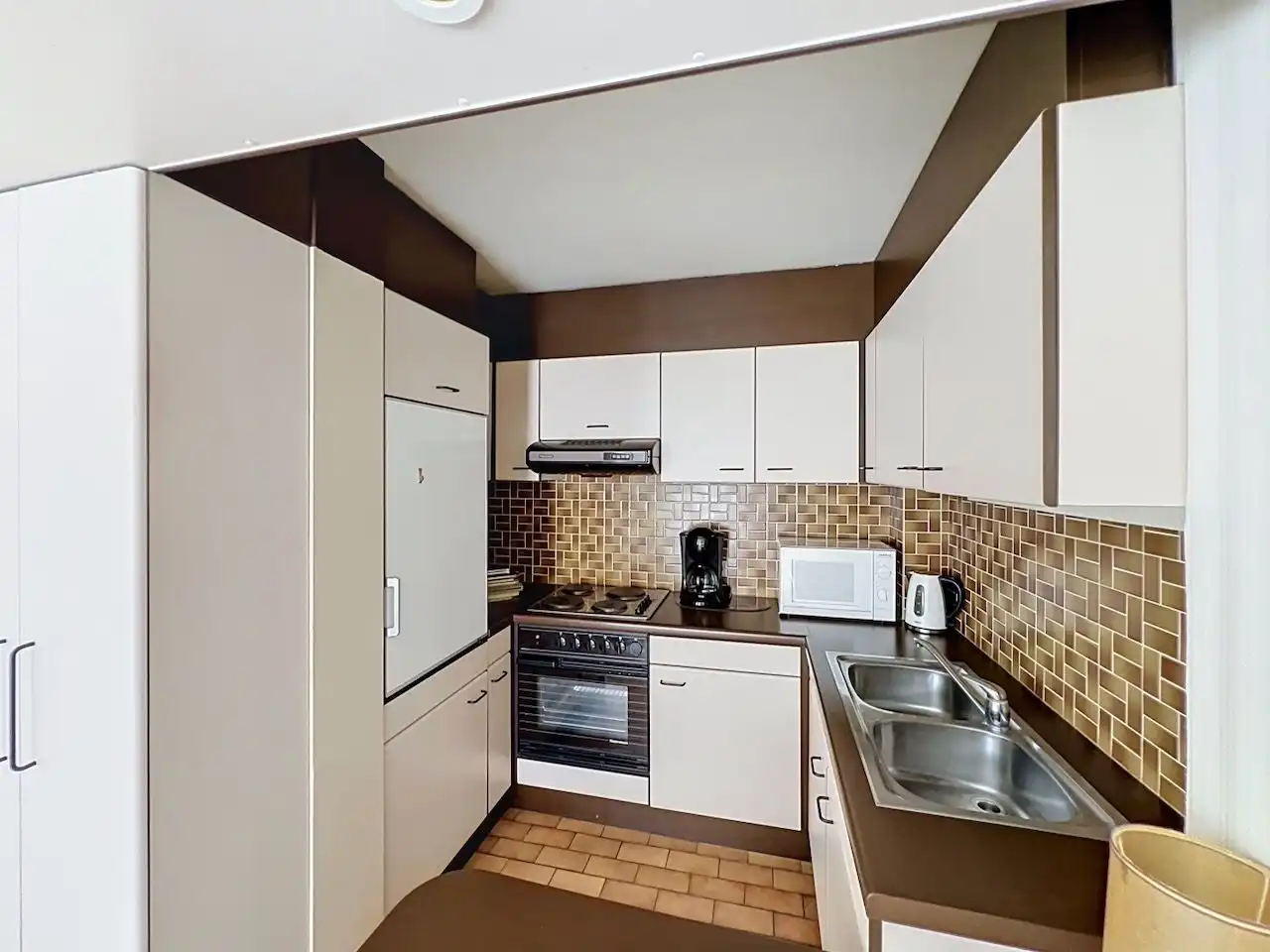 Perfect onderhouden appartement met zuidgericht terras in de O.L.Vrouwstraat ter hoogte van het Heldenplein foto 5