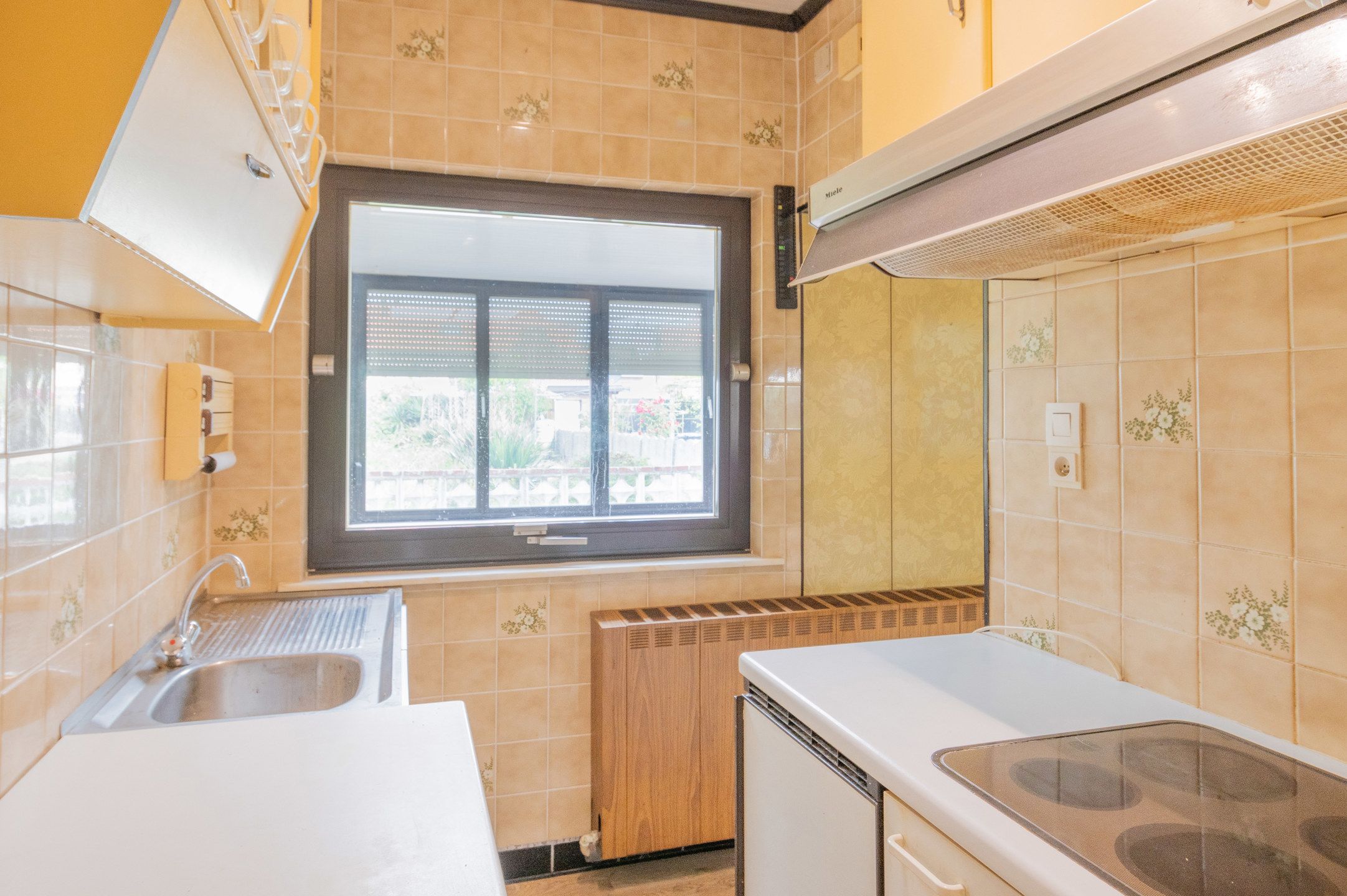 Knusse te renoveren woning met leuke tuin foto 16