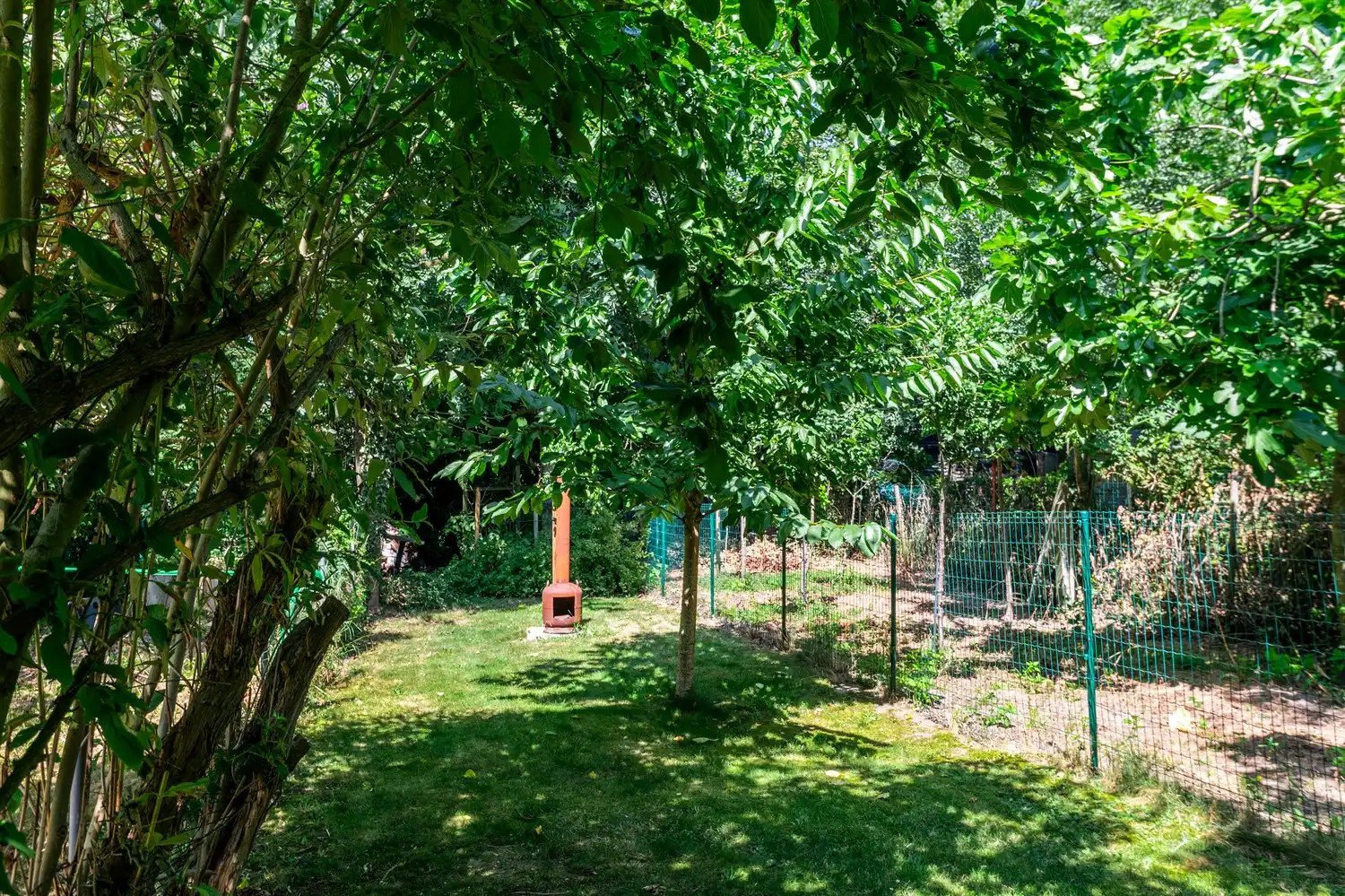 Rijwoning met 3 slpkrs en prachtige tuin foto 8