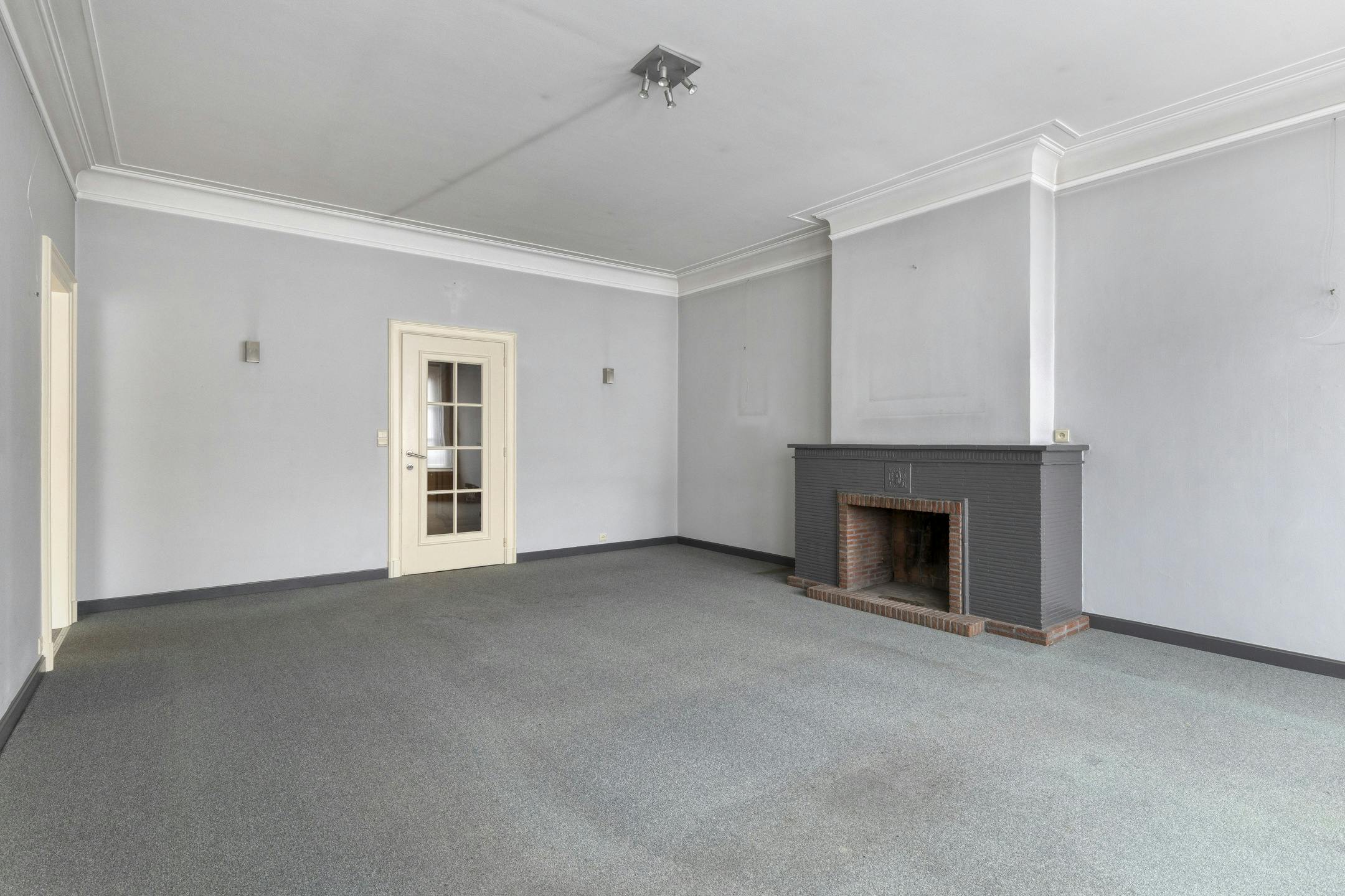 Patrimoniumvennootschap met handelspand en 2 appartementen foto 16