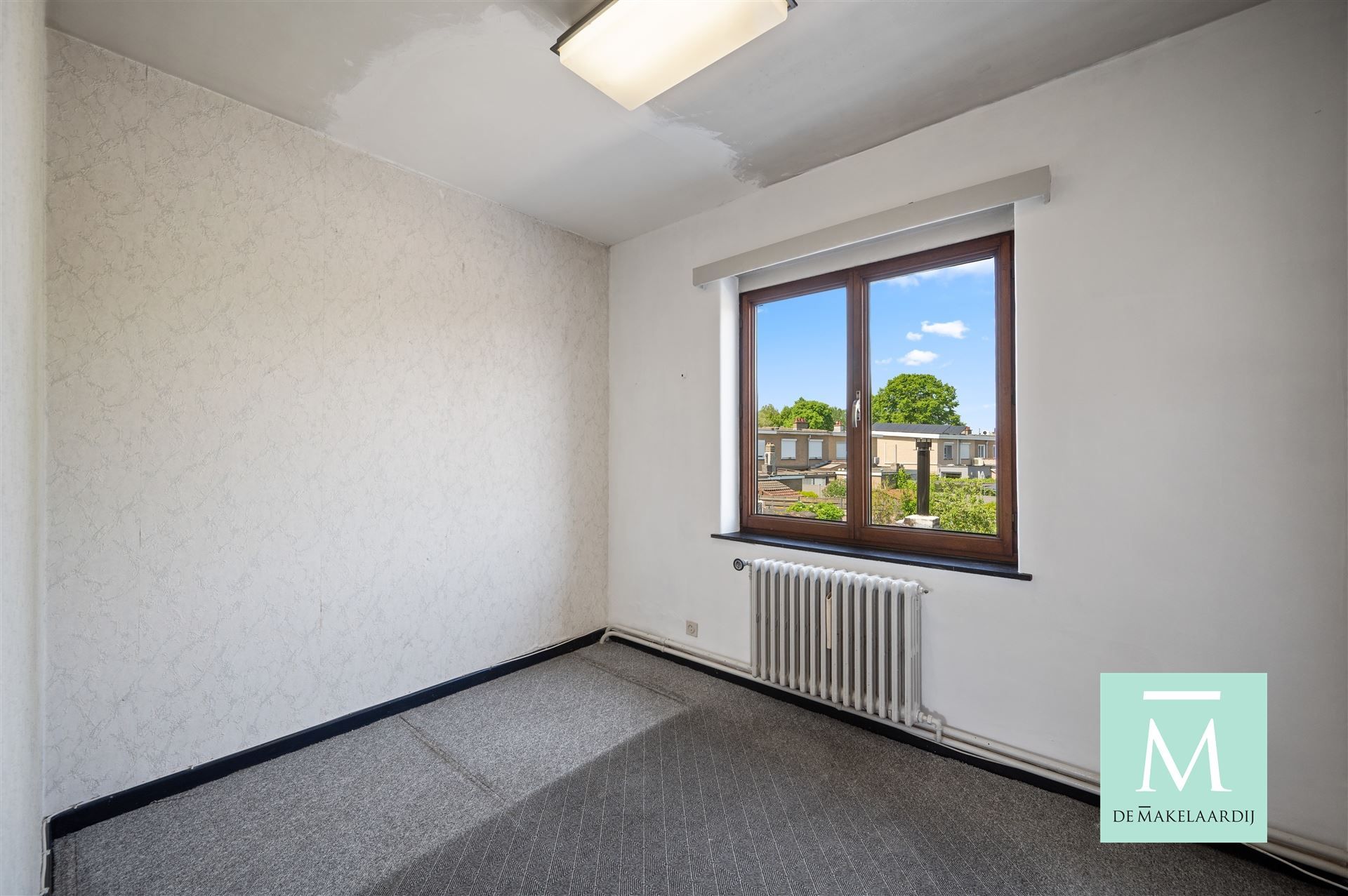 Op te frissen woning met achteruitweg, 3 slaapkamers en tuin op toplocatie! foto 9